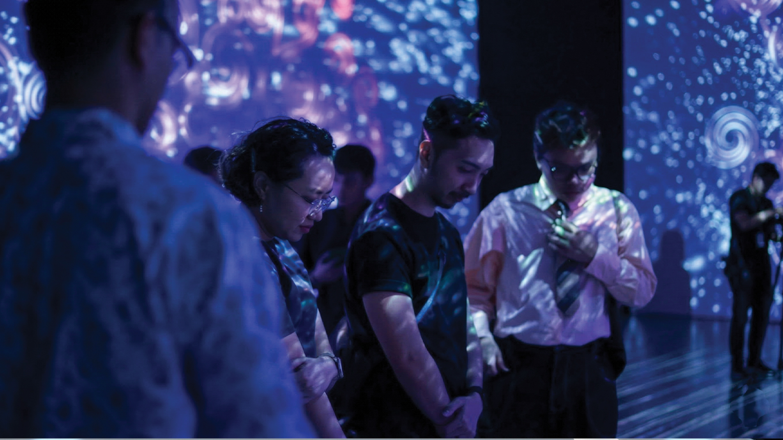 IKAT Malaysia exhibition — projection-mapped textile installation with traditional Malaysian patterns
